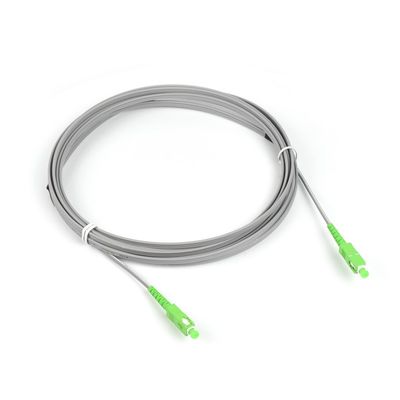 SC APC del cordón de remiendo del cable de alambre de descenso fibra óptica plana del modo FTTH de los cordones de remiendo del SC APC a la sola