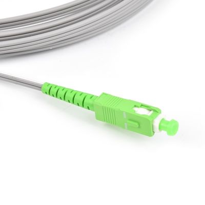 SC APC del cordón de remiendo del cable de alambre de descenso fibra óptica plana del modo FTTH de los cordones de remiendo del SC APC a la sola